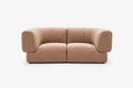 Sofa LAVA w beżowej tapicerce, widok z przodu.